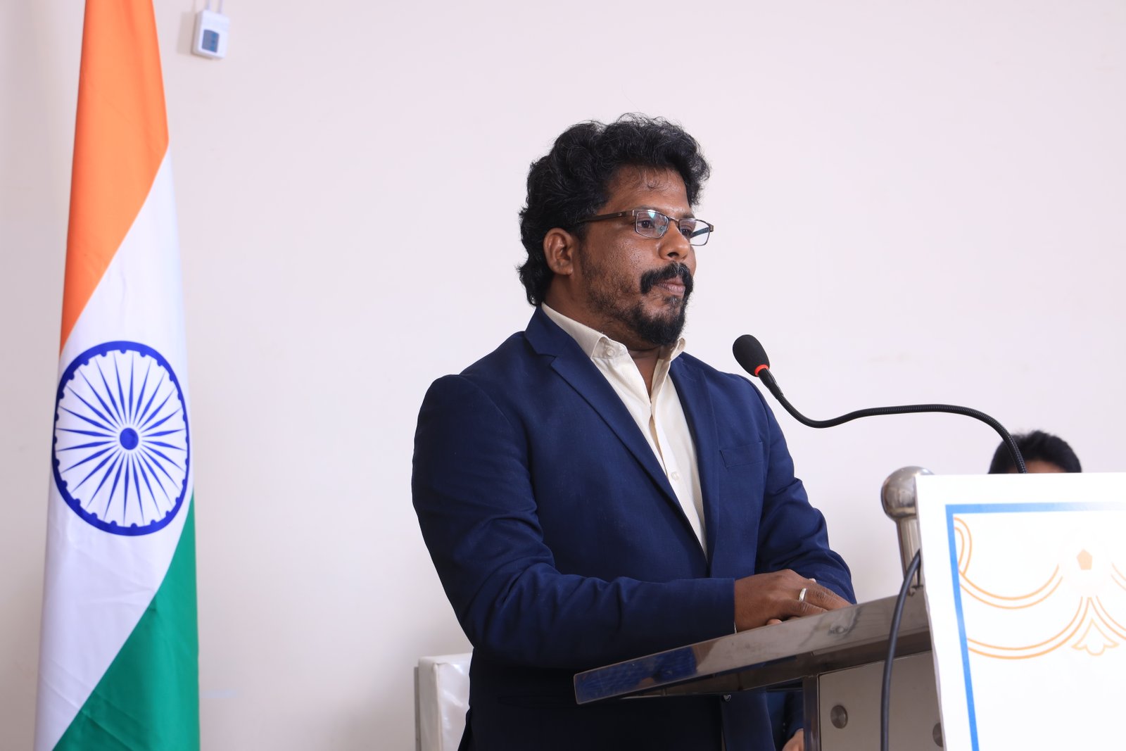 Recognition moment featuring Dr. Datchanamoorthy Ramu at the CREGU program